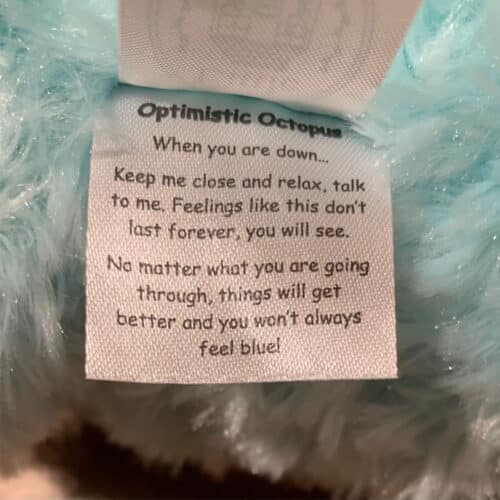 optimistic octopus weighted plush toy tag